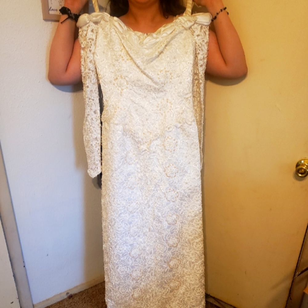 Ivory lace and satin wedding dress